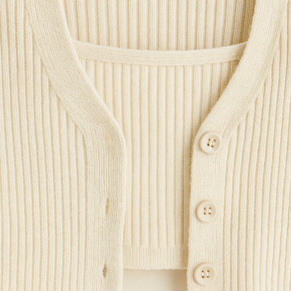 Close-up detail of Cream Ribbed Cropped Cardigan Set