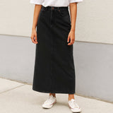 Person using Washed Black Longline Denim Skirt